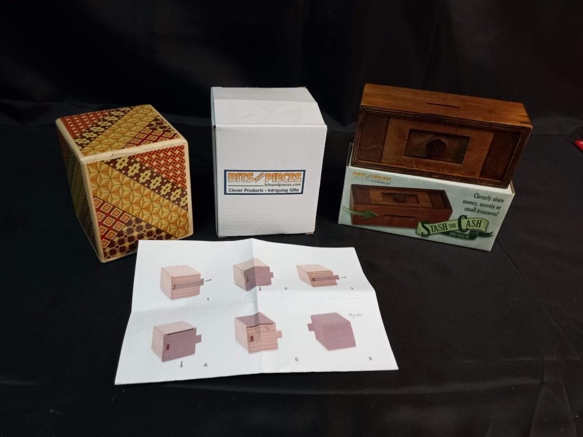 WOODEN PUZZLE BOX AND PUZZLE BANK | EstateSales.org