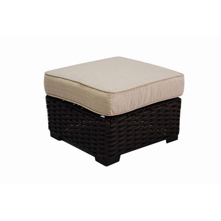 an ottoman with a cushion on top of it