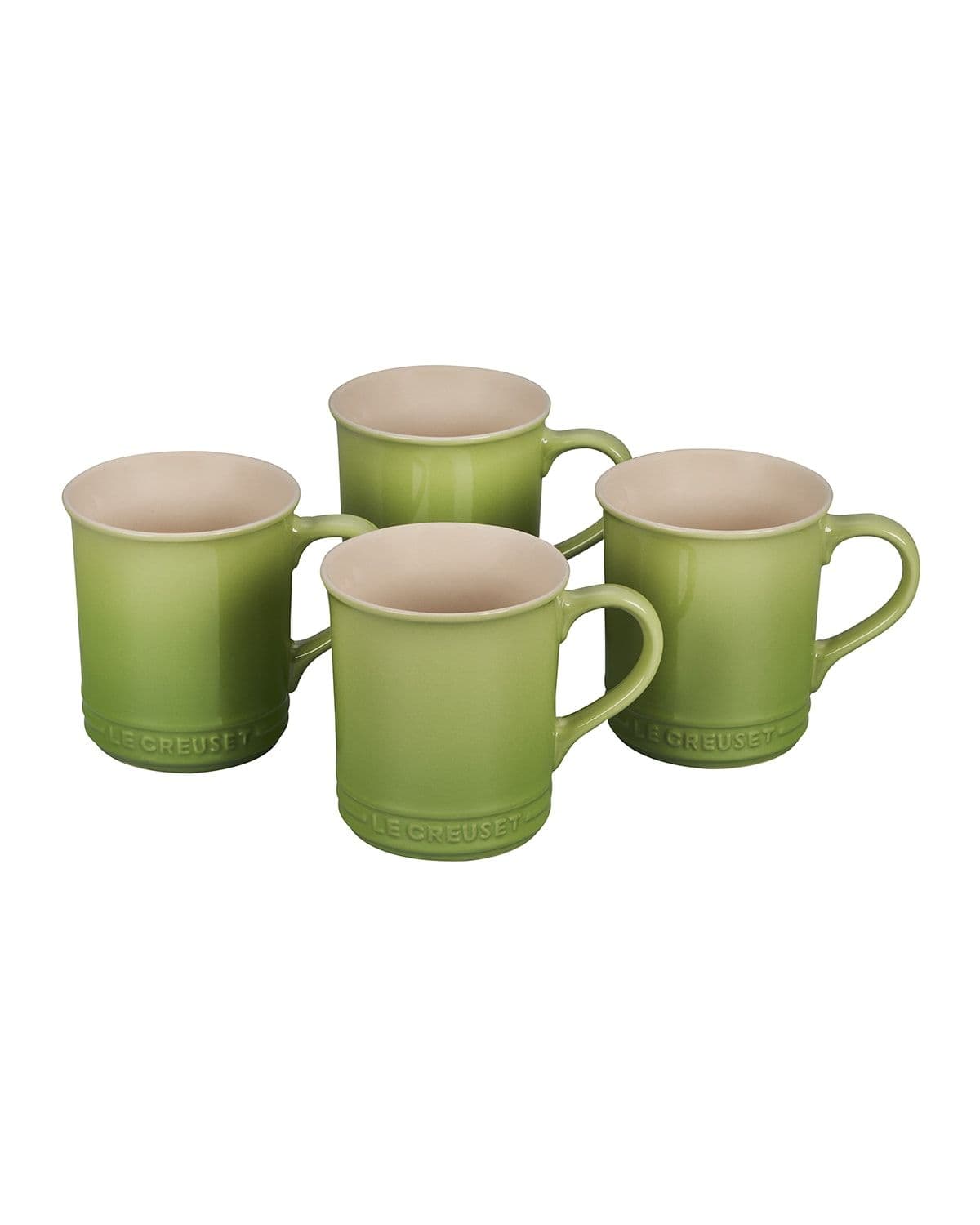 Set of four mugs. Made of stoneware. Each holds 12 ounces. Imported. Le ...