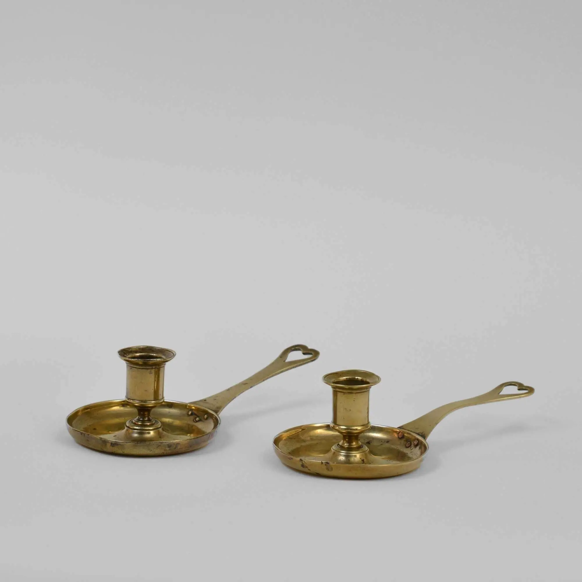 Pair French 18th century cast brass chambersticks in Antique Candlesticks